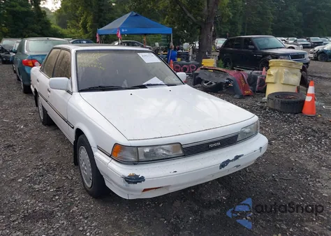 1988 Toyota Camry Le z USA, uszkodzony, nr VIN JT2SV22E5J3248025